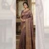 Elegant purple silk saree with Swarovski-style shimmer and zari border. Perfect for weddings, receptions, and festive celebrations. Banarsi Silk Saree with Swarovski-Style Shimmer & Zari Work